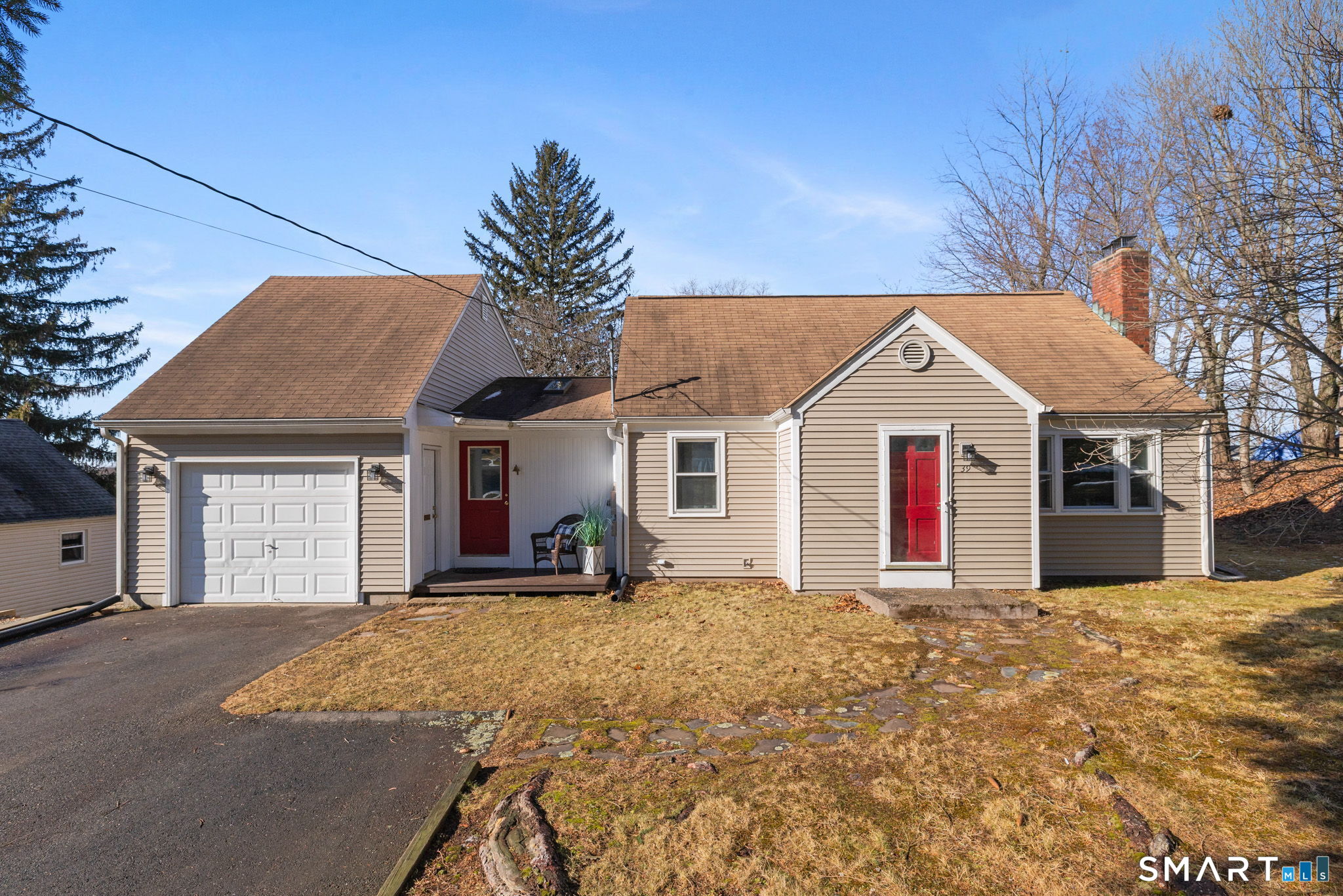 39 Charter Road Ellington, CT 06029 - Photo 1 of 1 a front view of a house with a yard