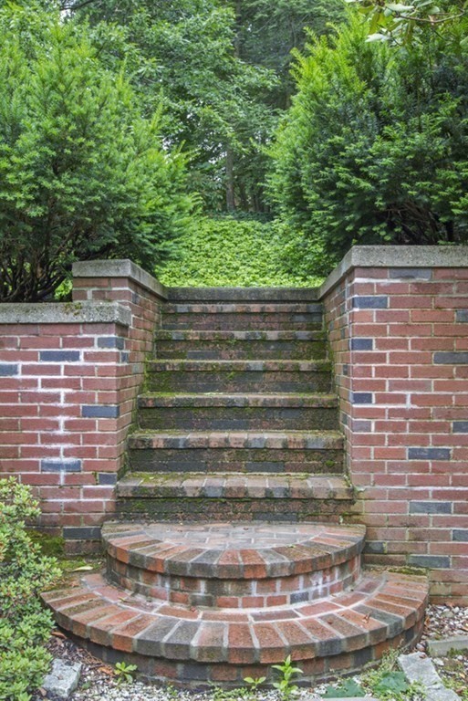 150 Buckminster Road Brookline, MA 02445 - Photo 18 of 25 a backyard of a house with green space