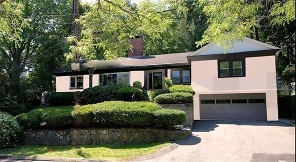 150 Buckminster Road Brookline, MA 02445 - Photo 24 of 25 a front view of a house with a yard