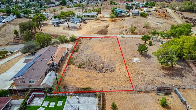 an aerial view of residential house and outdoor space