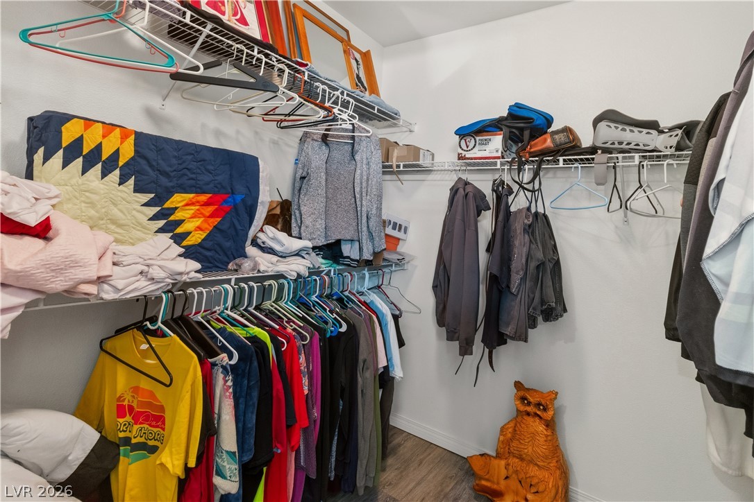 3589 Cottage Canyon Street Laughlin, NV 89029 - Photo 38 of 99 Walk in closet in Primary featuring wood finished floors