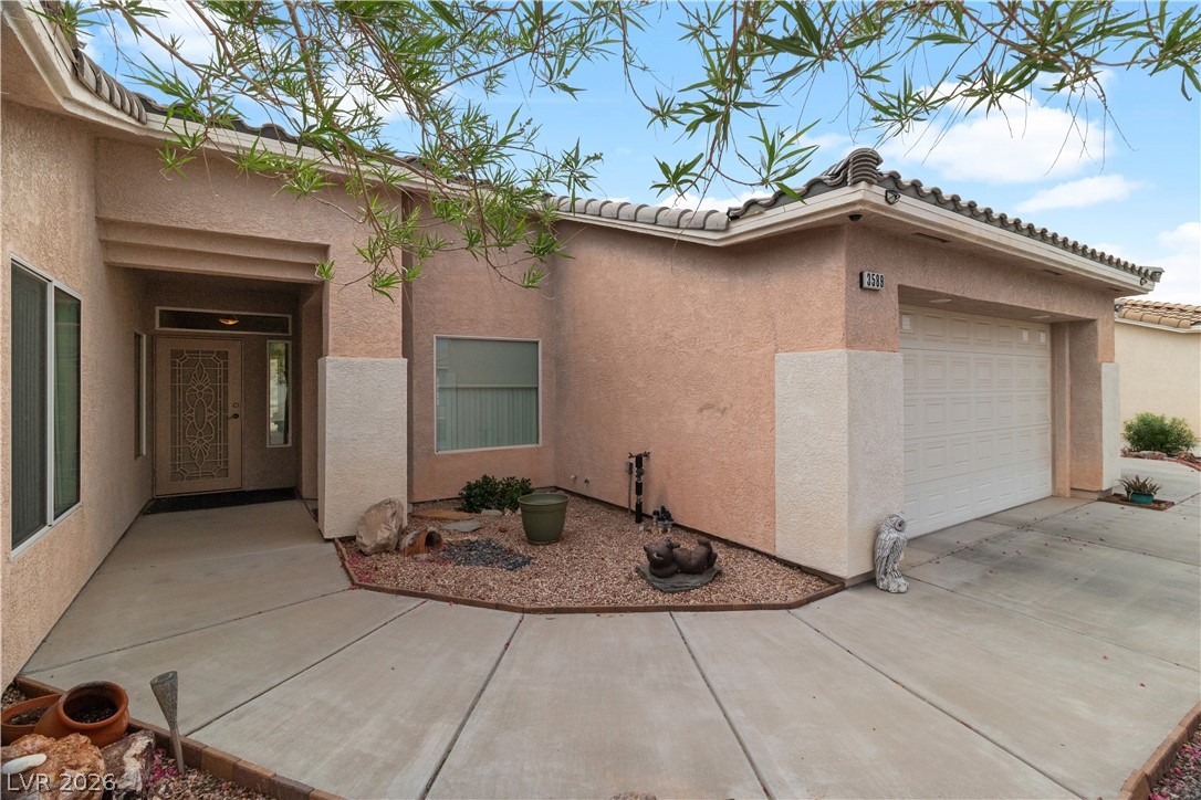 3589 Cottage Canyon Street Laughlin, NV 89029 - Photo 4 of 99 Property entrance featuring stucco siding