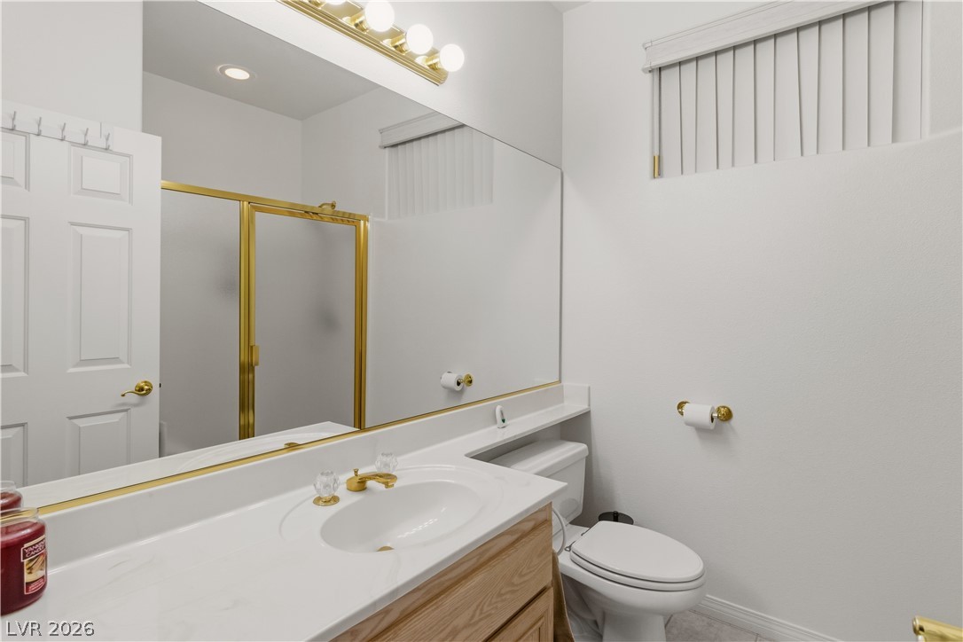 3589 Cottage Canyon Street Laughlin, NV 89029 - Photo 43 of 99 Hall Full Bathroom featuring vanity and a shower stall