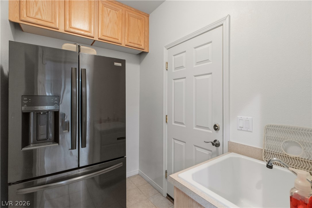3589 Cottage Canyon Street Laughlin, NV 89029 - Photo 47 of 99 Laundry room with cabinets and utility sink