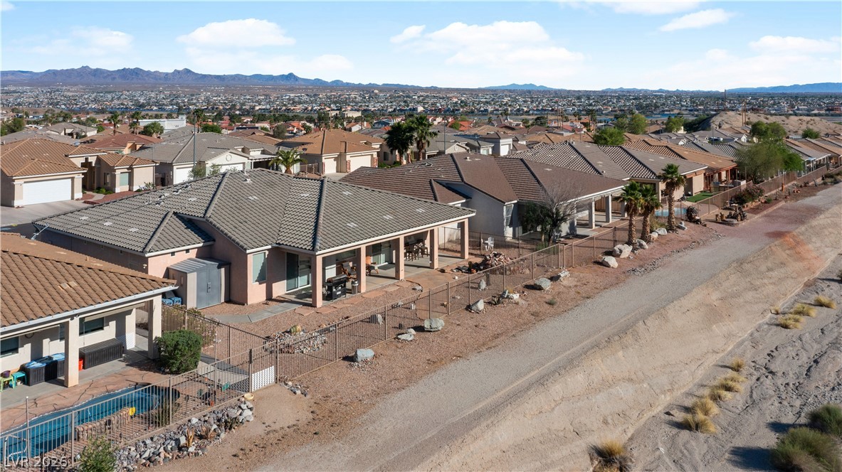 3589 Cottage Canyon Street Laughlin, NV 89029 - Photo 93 of 99 Aerial view of residential area featuring a mountain backdrop