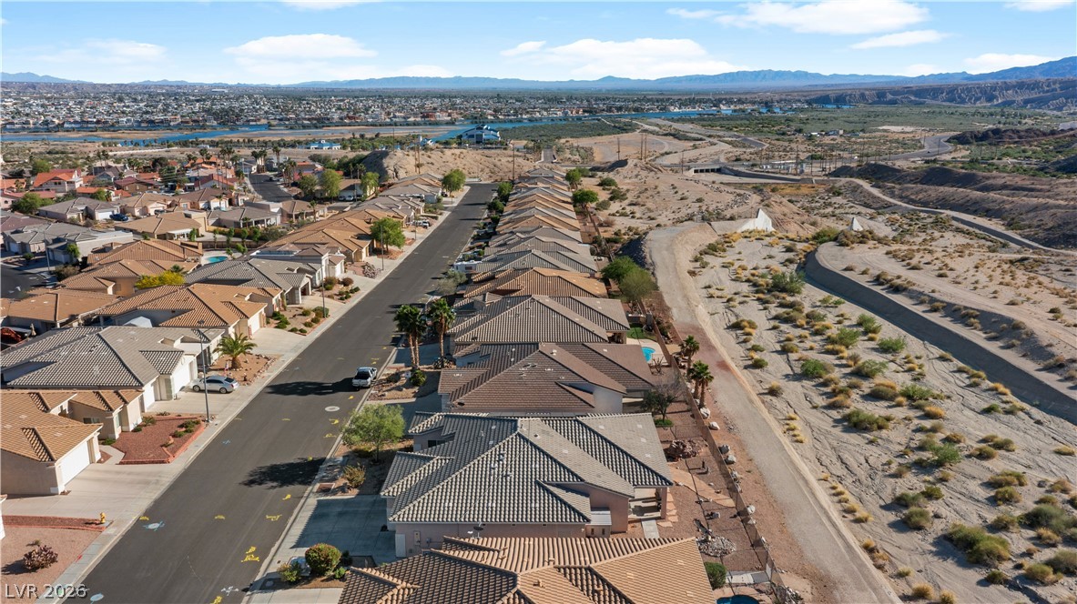 3589 Cottage Canyon Street Laughlin, NV 89029 - Photo 94 of 99 Aerial view of residential area featuring a mountain backdrop
