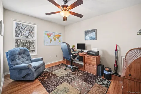 a workspace with furniture and window