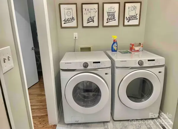 a utility room with dryer and washer