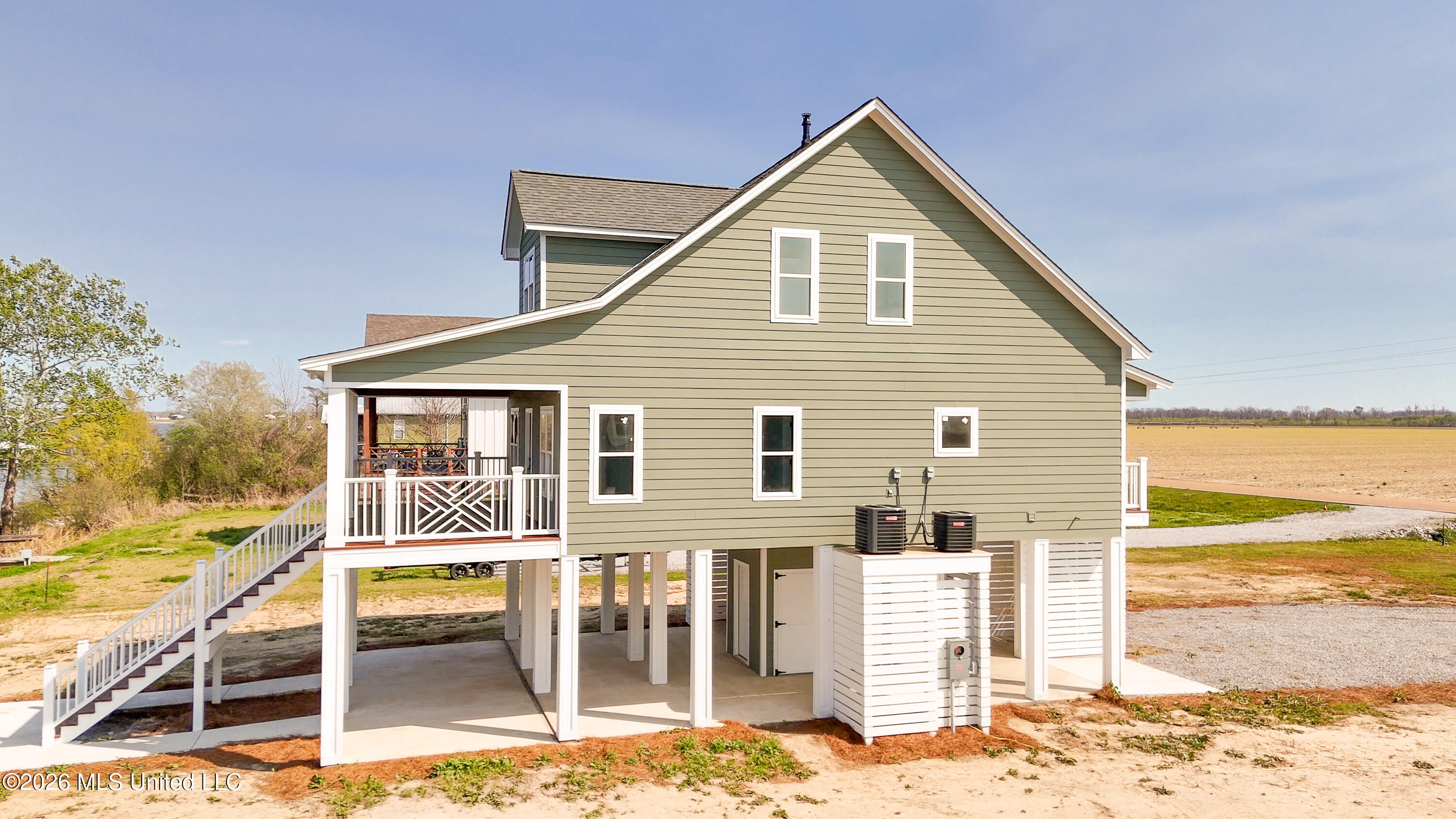 2410 Eagle Lake Shore Road Vicksburg, MS 39183 - Photo 41 of 55 Lakeside Aerial Side View 2