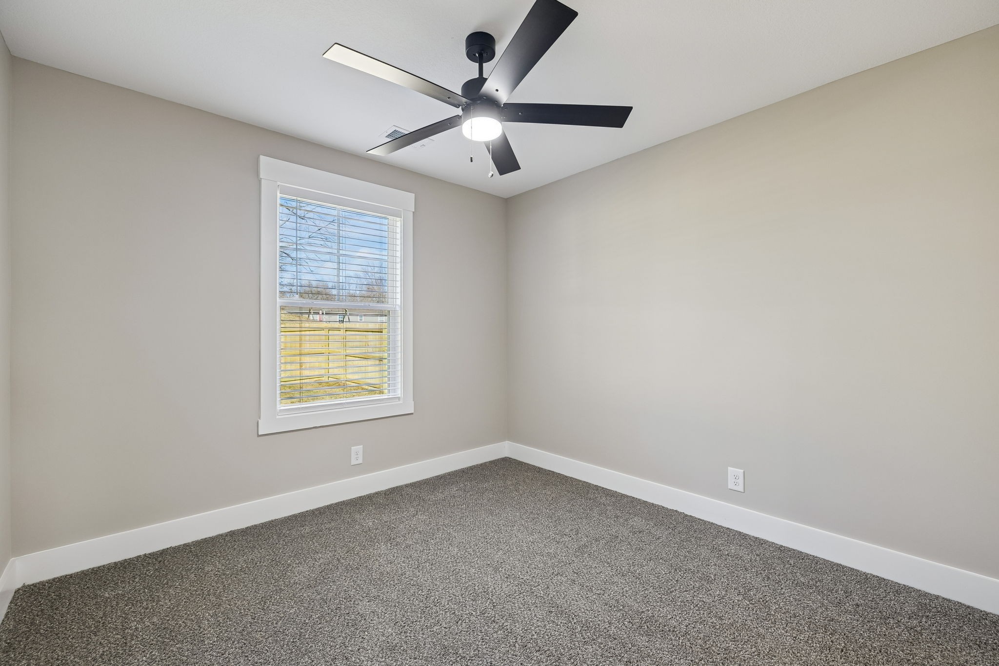14 Echo Ridge Oak Grove, KY 42262 - Photo 22 of 40 an empty room with a window and a fan
