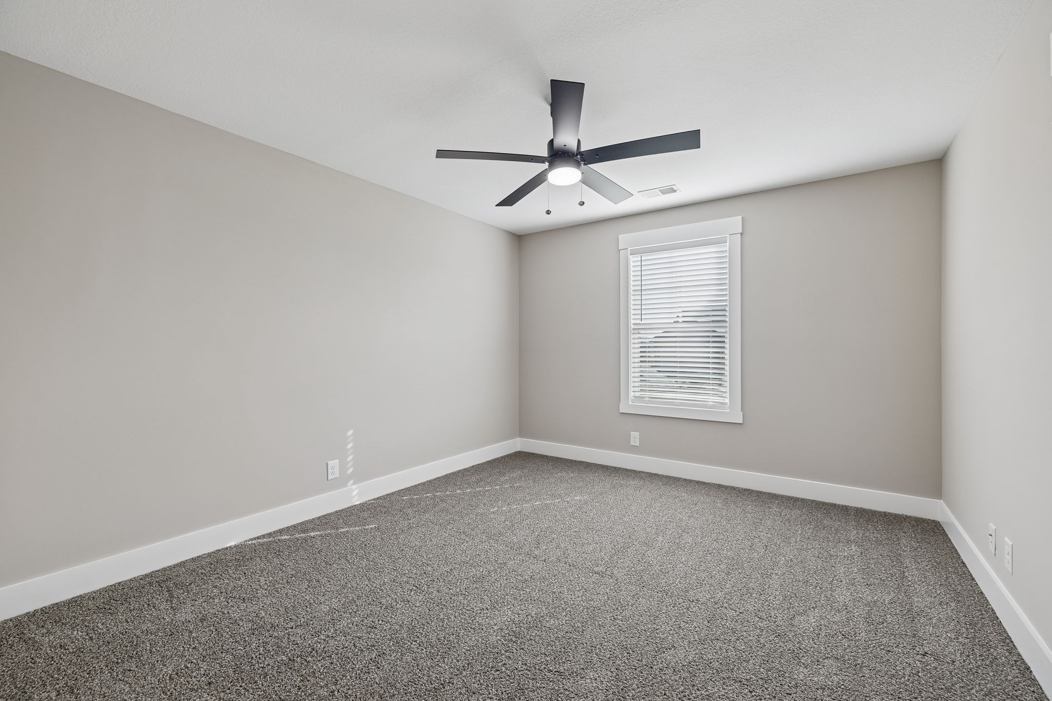 14 Echo Ridge Oak Grove, KY 42262 - Photo 24 of 40 an empty room with a window and ceiling fan
