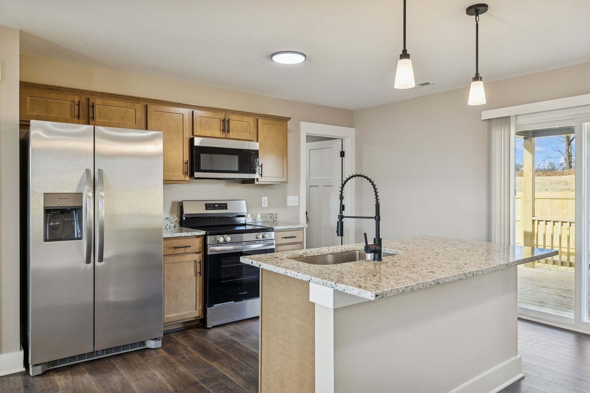 14 Echo Ridge Oak Grove, KY 42262 - Photo 10 of 40 a kitchen with stainless steel appliances granite countertop a refrigerator a stove a sink and a microwave