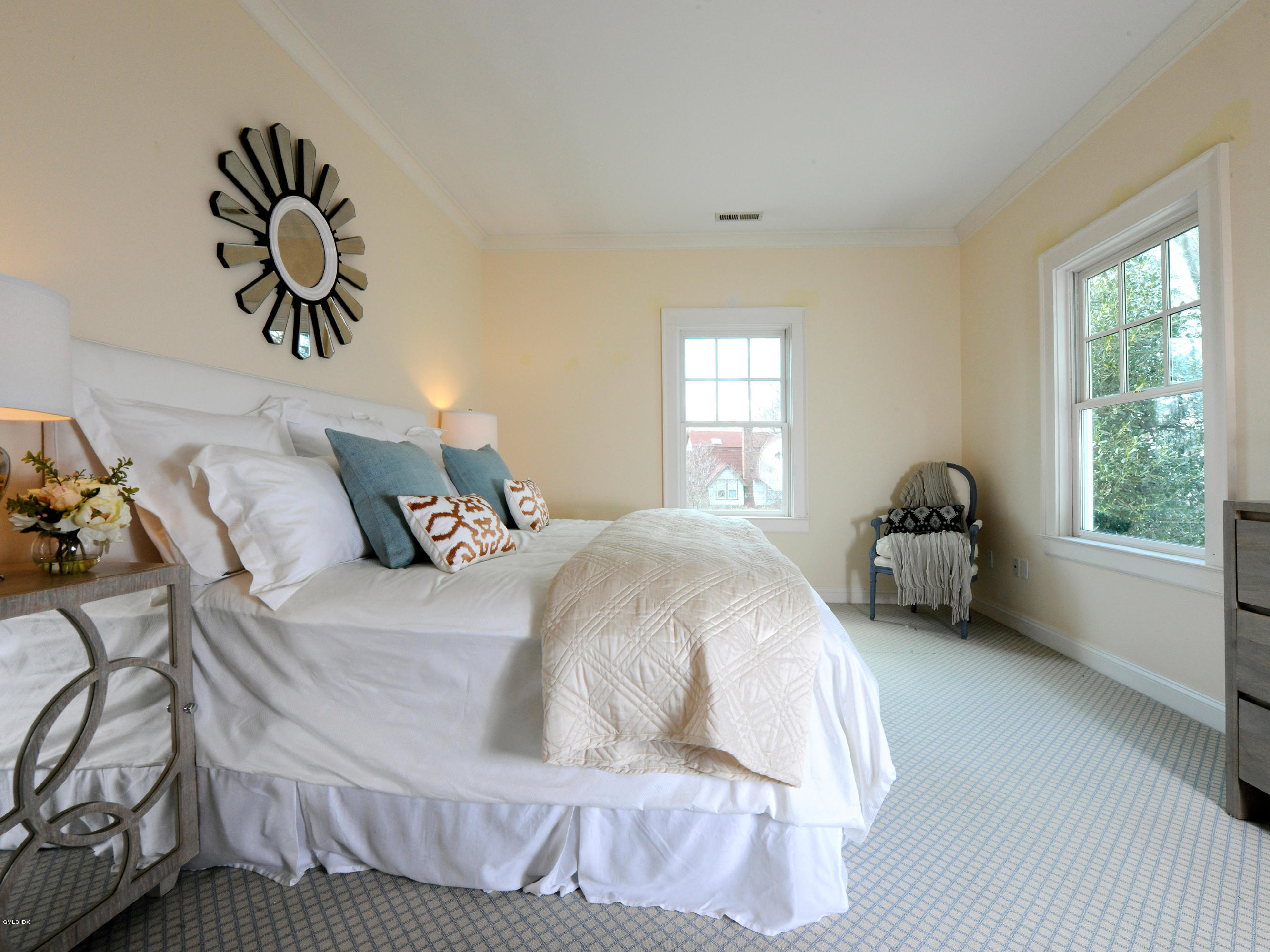 23 Pierce Road Riverside, CT 06878 - Photo 12 of 26 a bedroom with a bed and a window