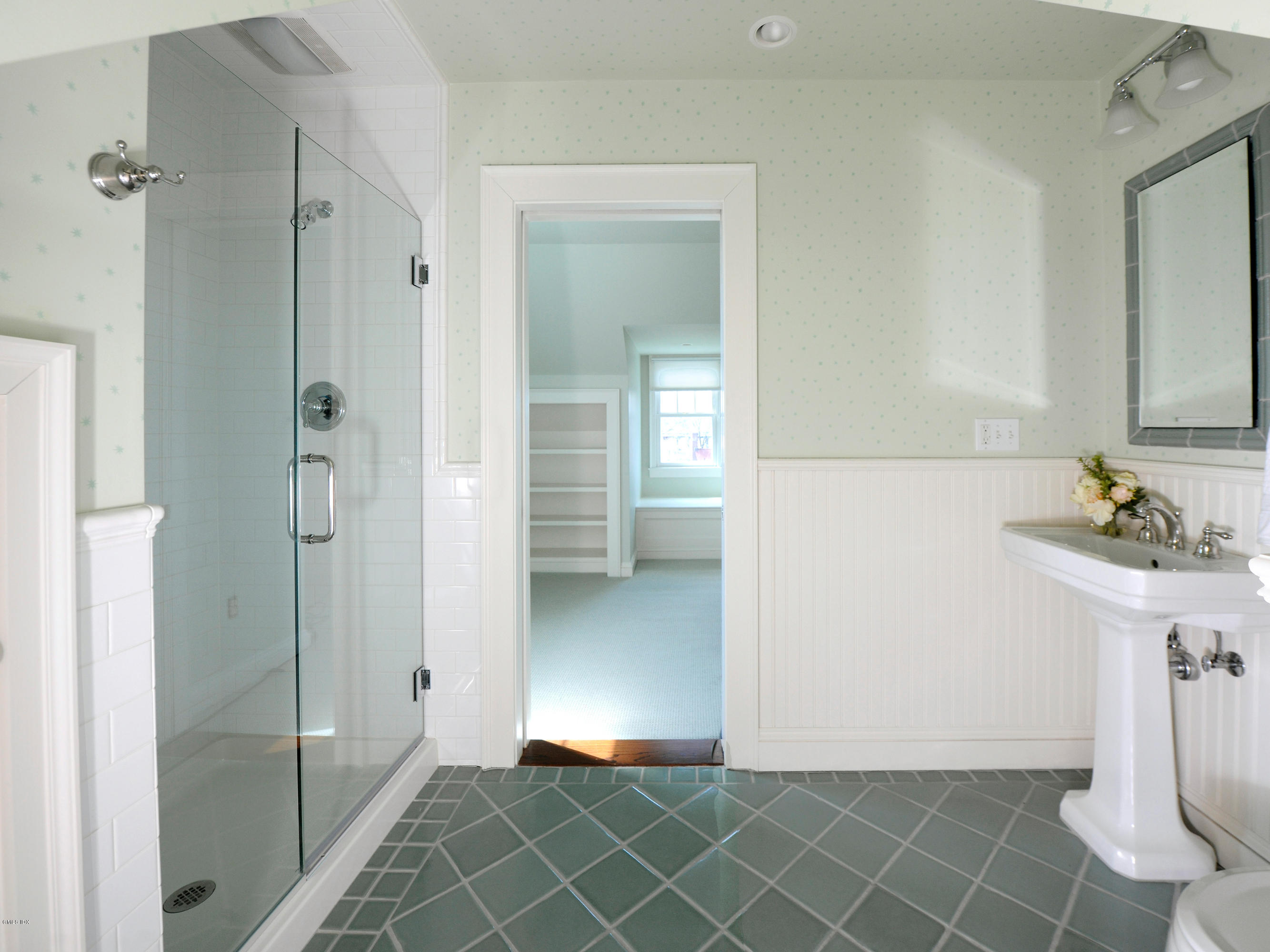 23 Pierce Road Riverside, CT 06878 - Photo 17 of 26 a bathroom with a sink and shower