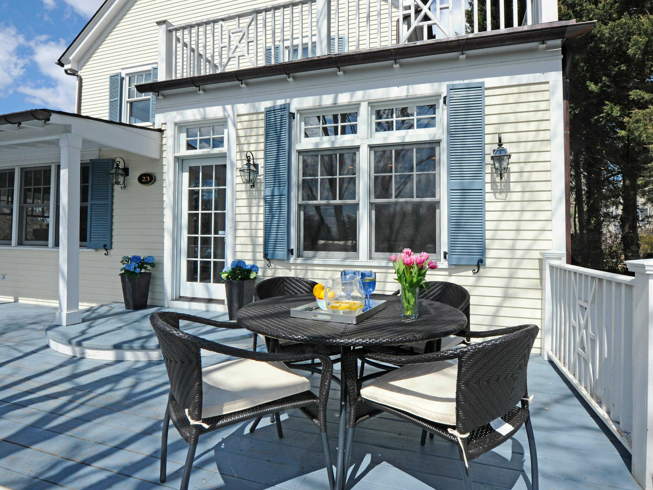 23 Pierce Road Riverside, CT 06878 - Photo 20 of 26 a view of a house with patio and wooden floor
