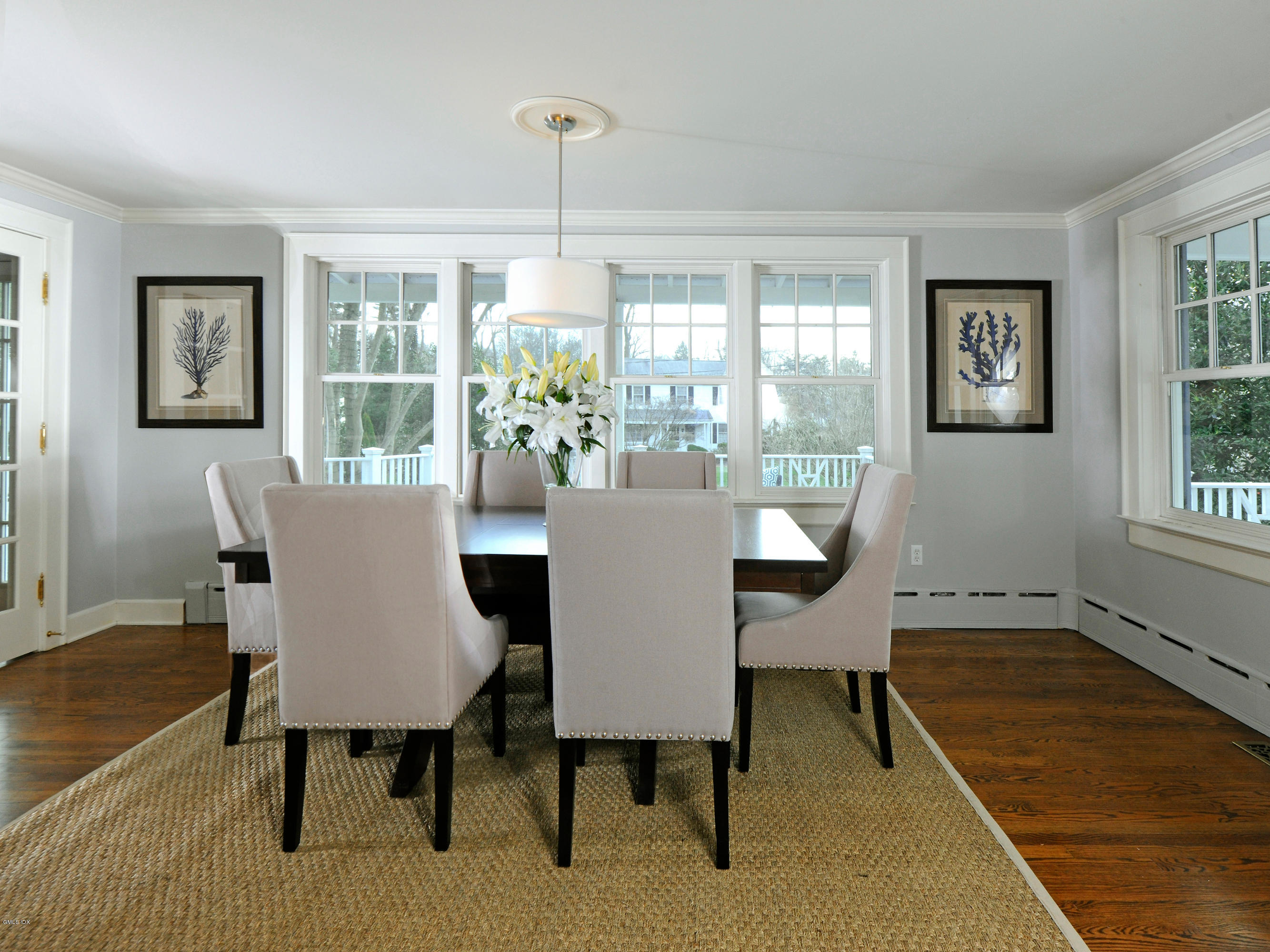 23 Pierce Road Riverside, CT 06878 - Photo 4 of 26 a view of a dining room with furniture window and wooden floor