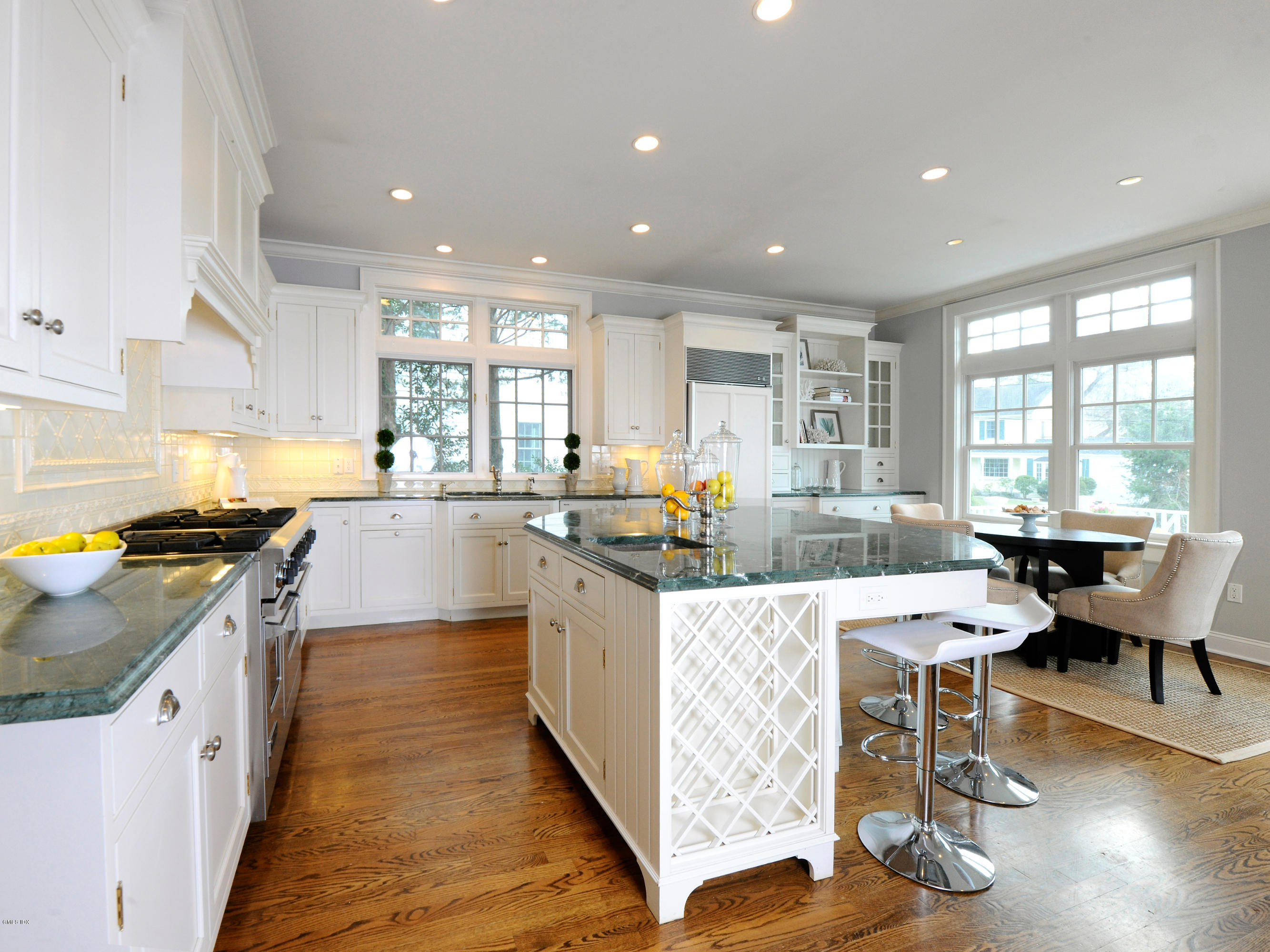 23 Pierce Road Riverside, CT 06878 - Photo 8 of 26 a large kitchen with kitchen island a large island in it