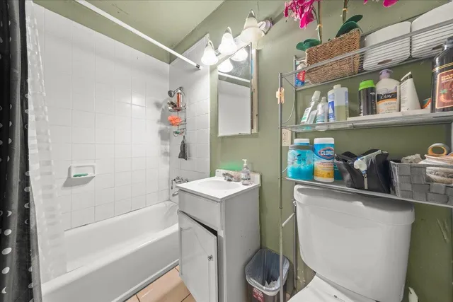 a view of car parked in front of a house