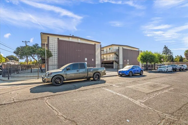 a view of a house with a tree