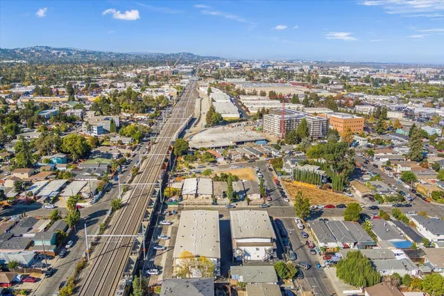 a view of a city with furniture