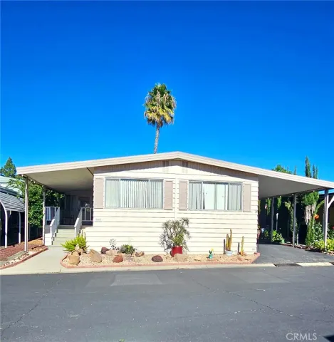 a front view of a house with a garage