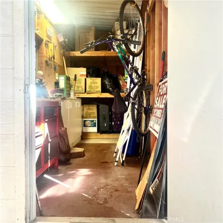 a view of living room with furniture and a fireplace
