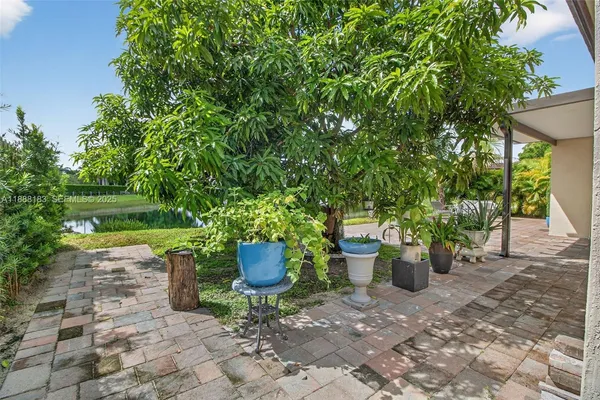 a view of a lake with a big yard