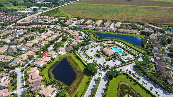 an aerial view of swimming pool outdoor seating and outdoor space