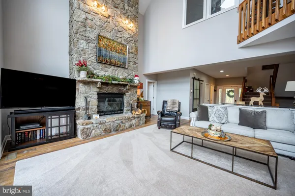 a room with a table and a painting on the wall