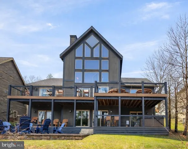 a view of a balcony with furniture