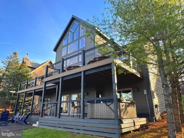 a view of kitchen with a sink and wooden floor