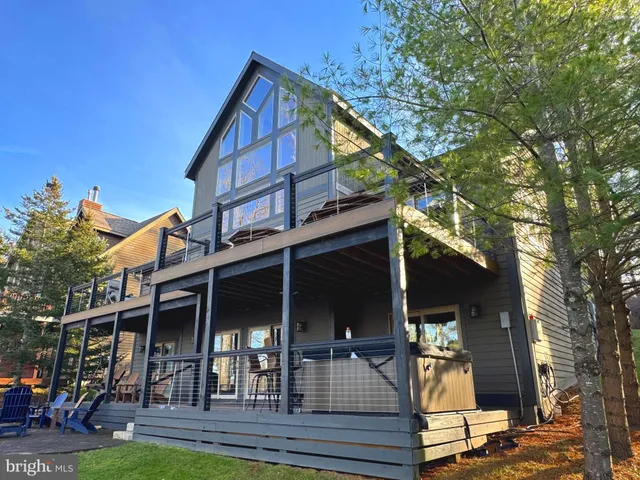 a view of kitchen with a sink and wooden floor
