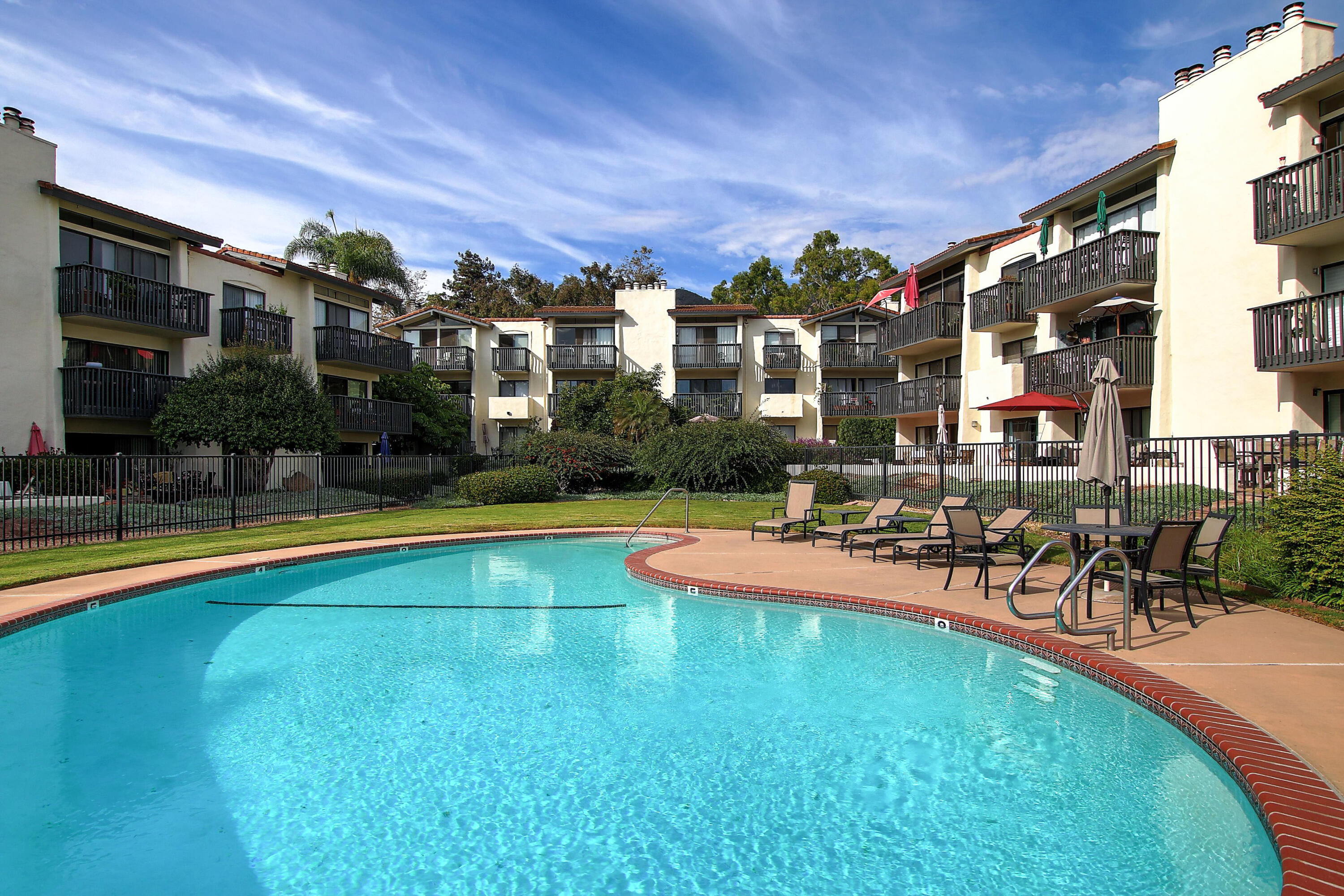 3375 Foothill Road, Unit 333 Carpinteria, CA 93013 - Photo 20 of 23 a view of a swimming pool with outdoor seating