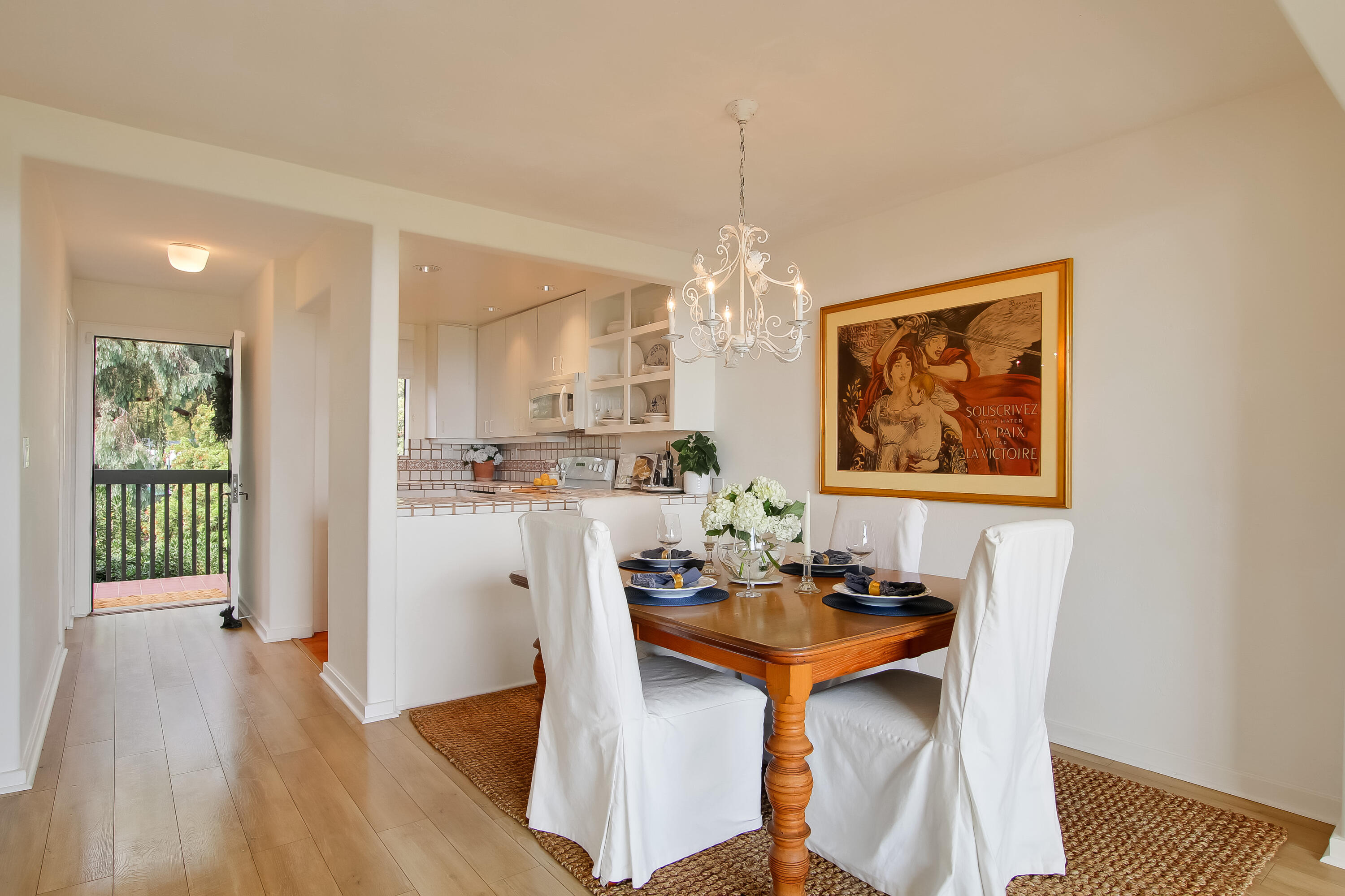 3375 Foothill Road, Unit 333 Carpinteria, CA 93013 - Photo 10 of 23 a view of a dining room with furniture and wooden floor