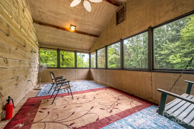 a balcony view with a outdoor seating