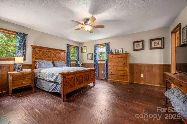 a bedroom with a bed and a cabinets