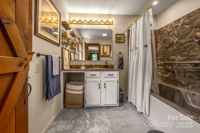 a kitchen with stainless steel appliances a refrigerator and a stove