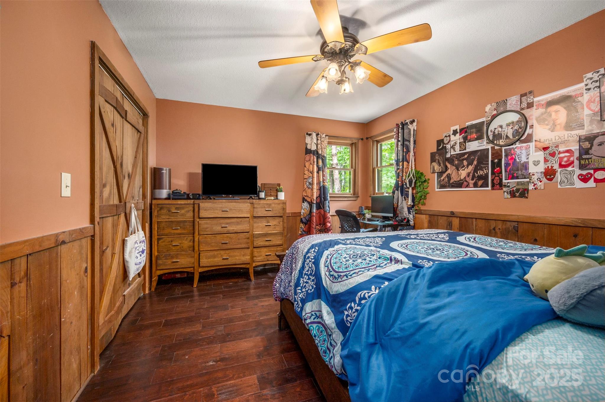 307 Owl Hollow Road Mill Spring, NC 28756 - Photo 20 of 31 a bed room with a bed and a television