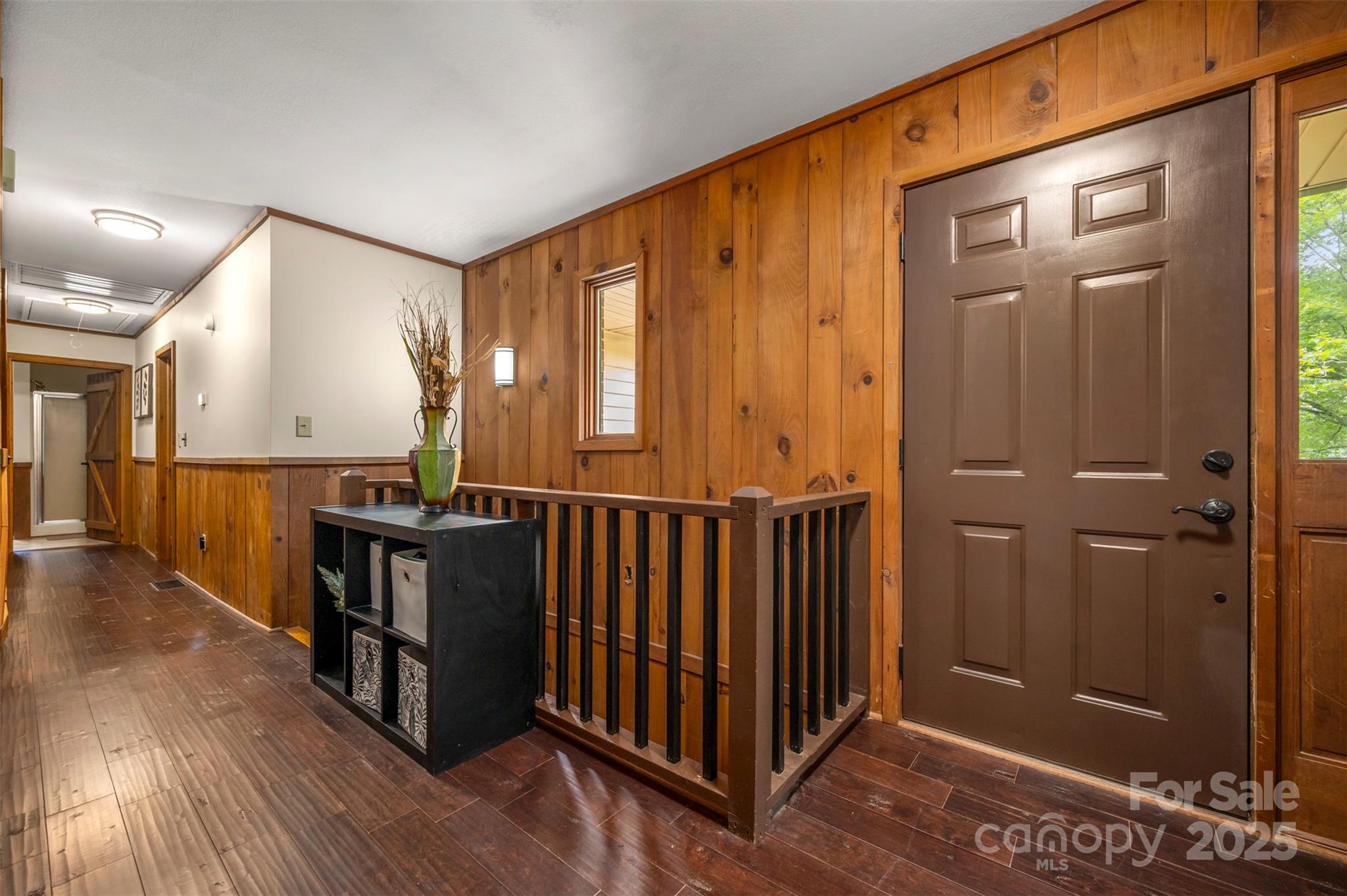 307 Owl Hollow Road Mill Spring, NC 28756 - Photo 3 of 31 a view of a hallway with entryway door
