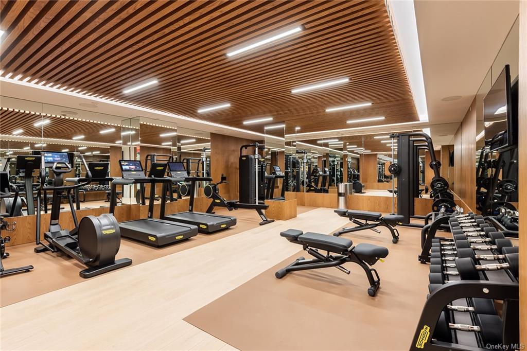 1228 Madison Avenue, Unit 8 Manhattan, NY 10128 - Photo 13 of 17 a view of a room with gym equipment