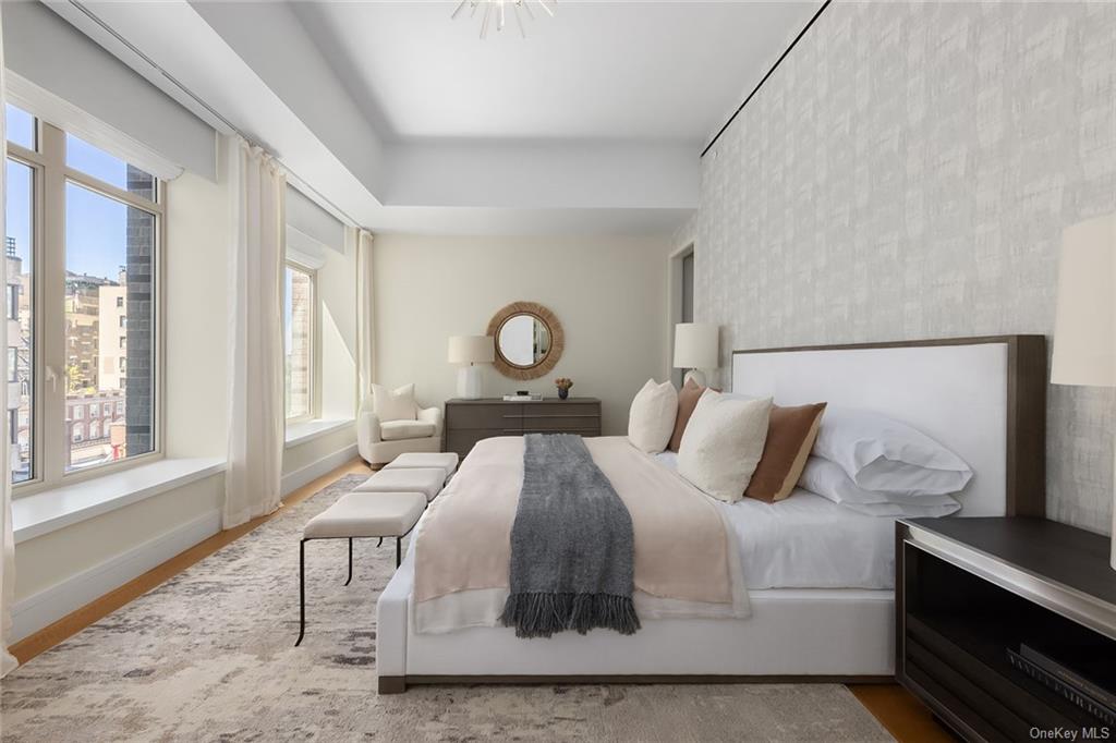 1228 Madison Avenue, Unit 8 Manhattan, NY 10128 - Photo 4 of 17 a bedroom with a bed and window