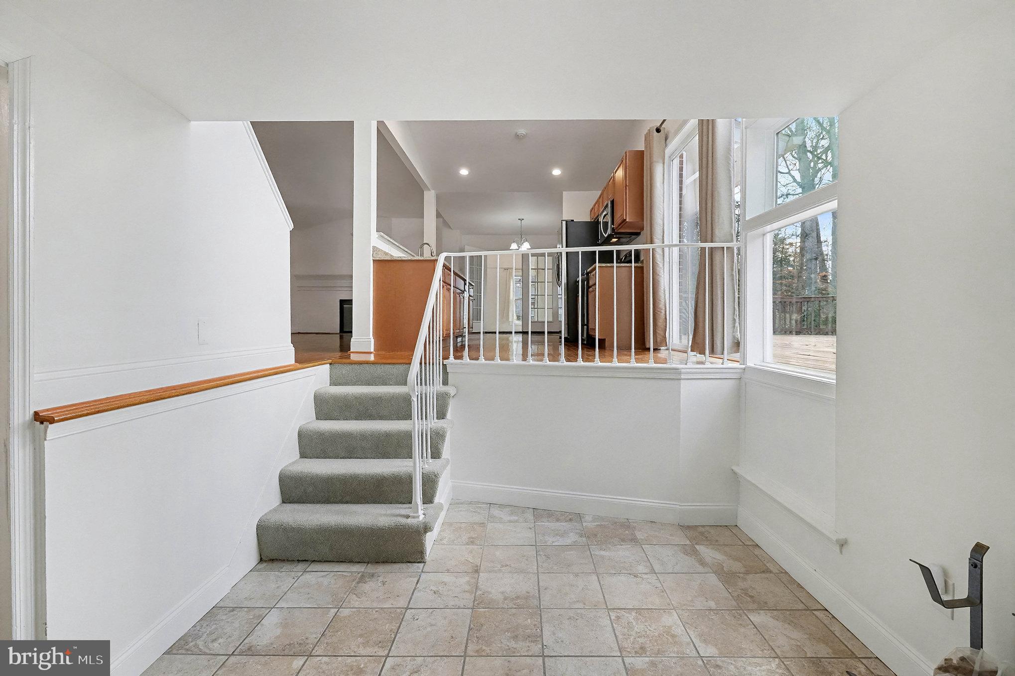 18316 Cabin Road Triangle, VA 22172 - Photo 18 of 42 a view of entryway and hall with wooden floor