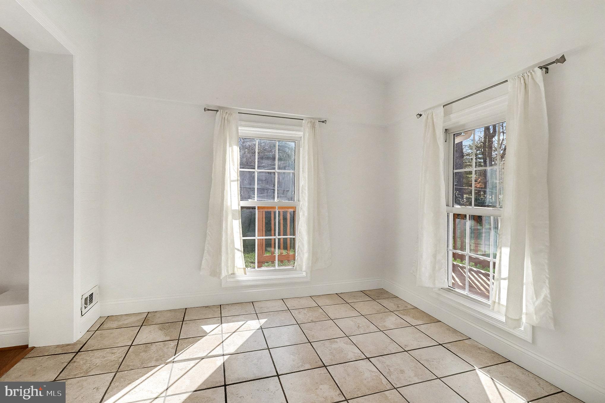 18316 Cabin Road Triangle, VA 22172 - Photo 19 of 42 a view of an empty room with a window