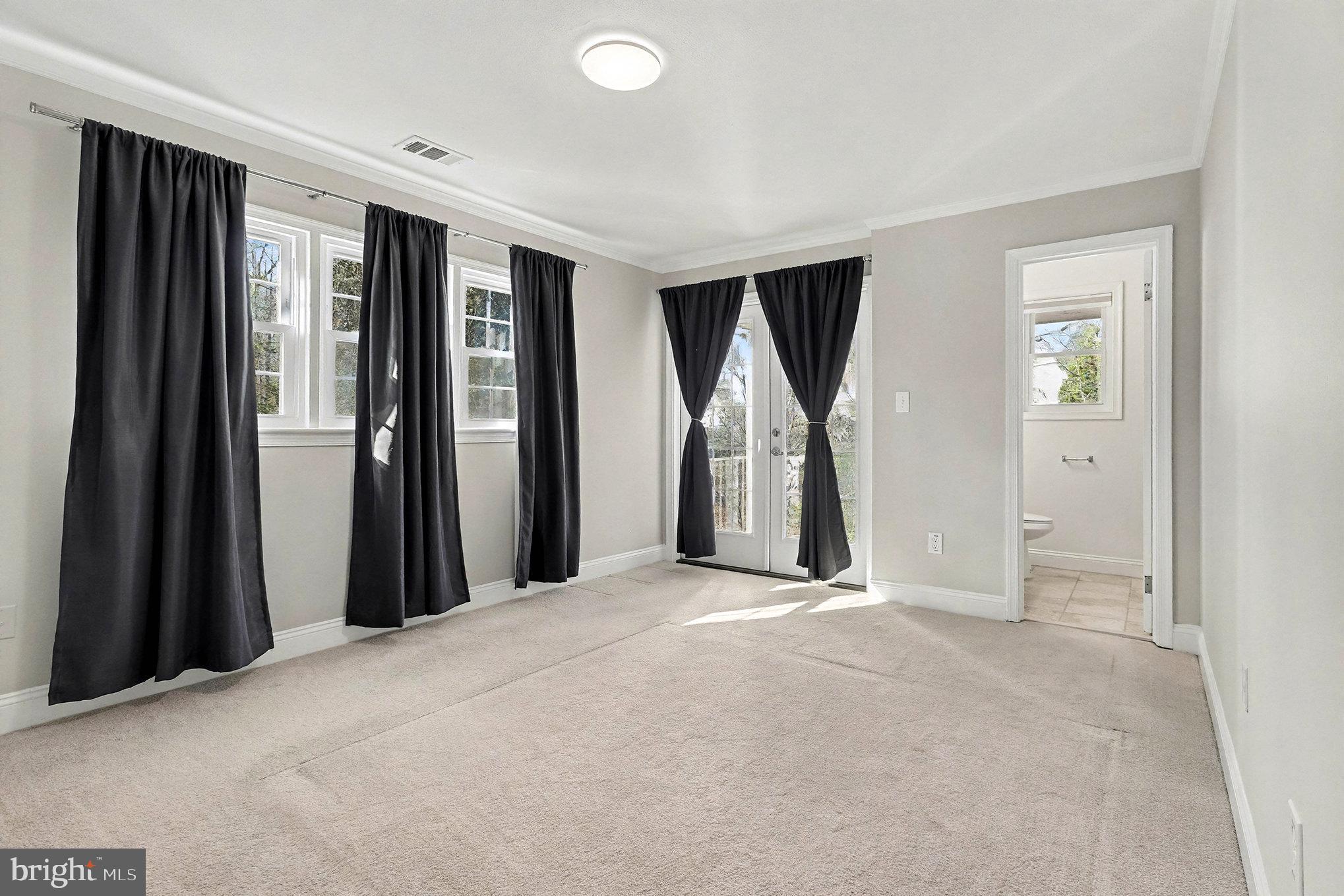 18316 Cabin Road Triangle, VA 22172 - Photo 21 of 42 an empty room with closet and a fireplace