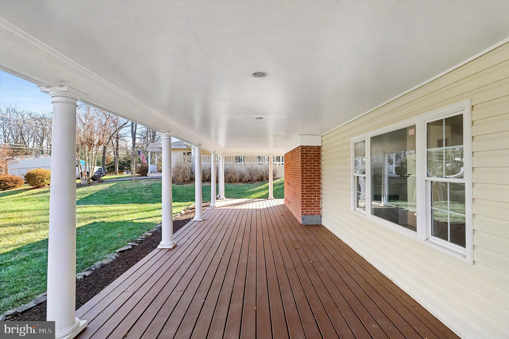 18316 Cabin Road Triangle, VA 22172 - Photo 3 of 42 a view of a house with a yard