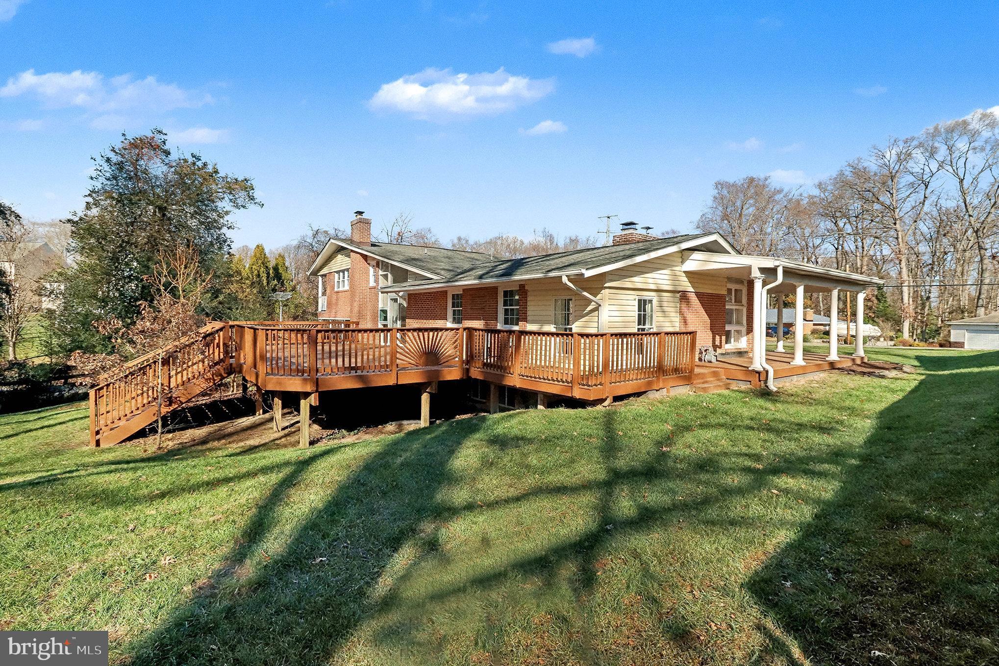18316 Cabin Road Triangle, VA 22172 - Photo 34 of 42 a view of a house with a big yard