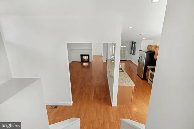 a view of a living room with furniture