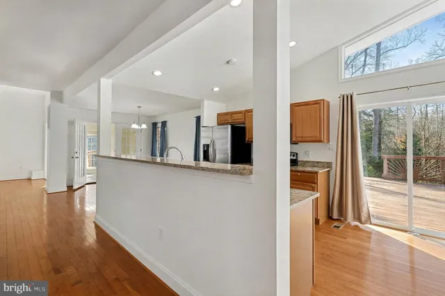 a view of a living room with a large window