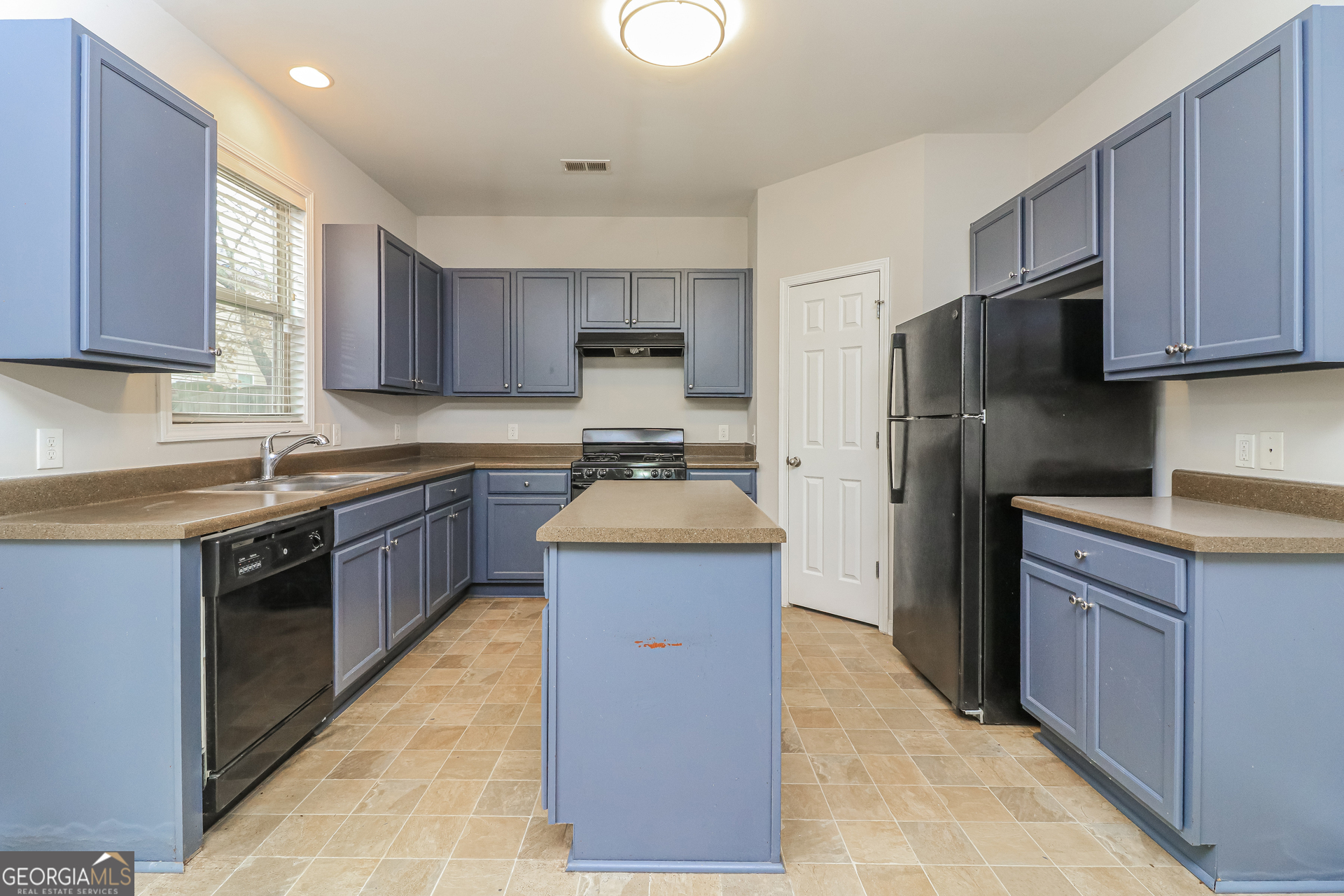 2570 Kolb Manor Circle Southwest Marietta, GA 30008 - Photo 11 of 22 a kitchen with stainless steel appliances granite countertop a stove a sink dishwasher a refrigerator and a oven