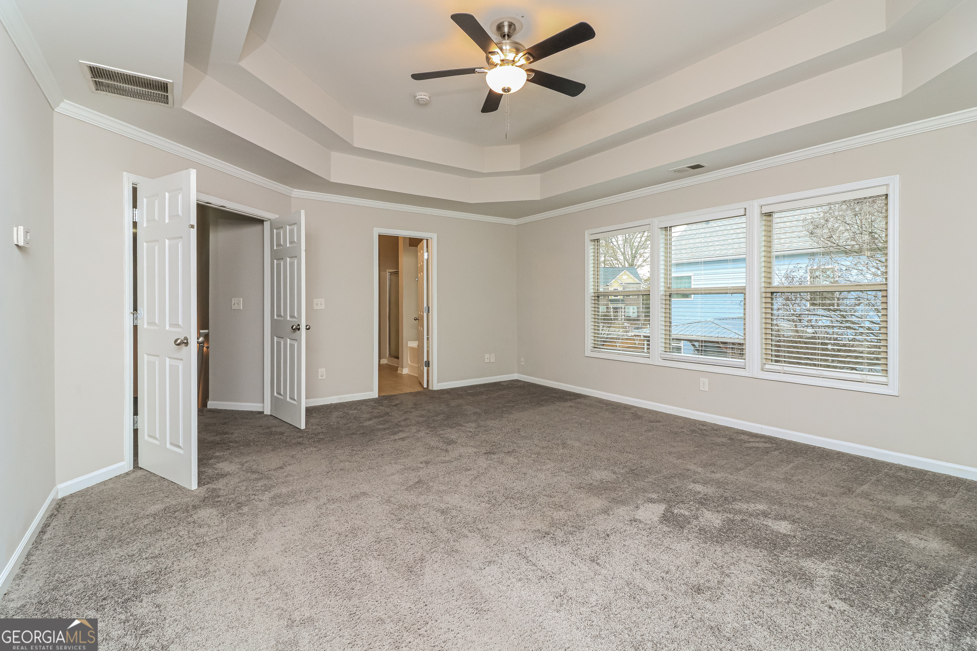 2570 Kolb Manor Circle Southwest Marietta, GA 30008 - Photo 13 of 22 a view of an empty room with a window